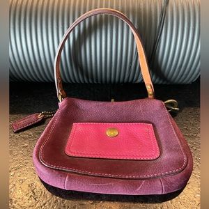 Coach vintage purple and pink clutch.